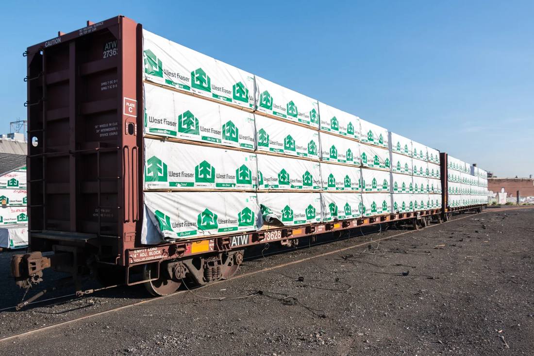 Flatcar of lumber at the Maspeth rail yard